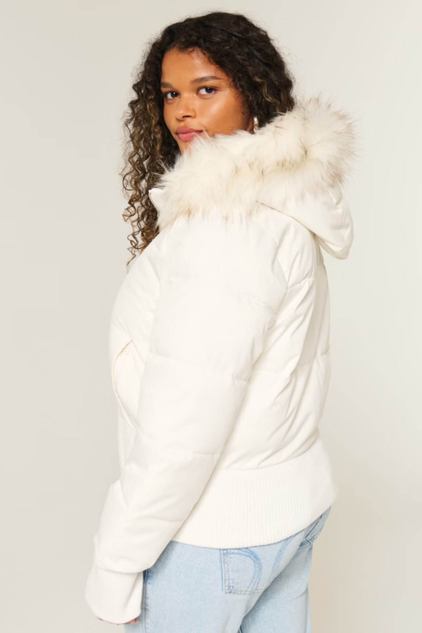 Melangé- Puffer mit Fell